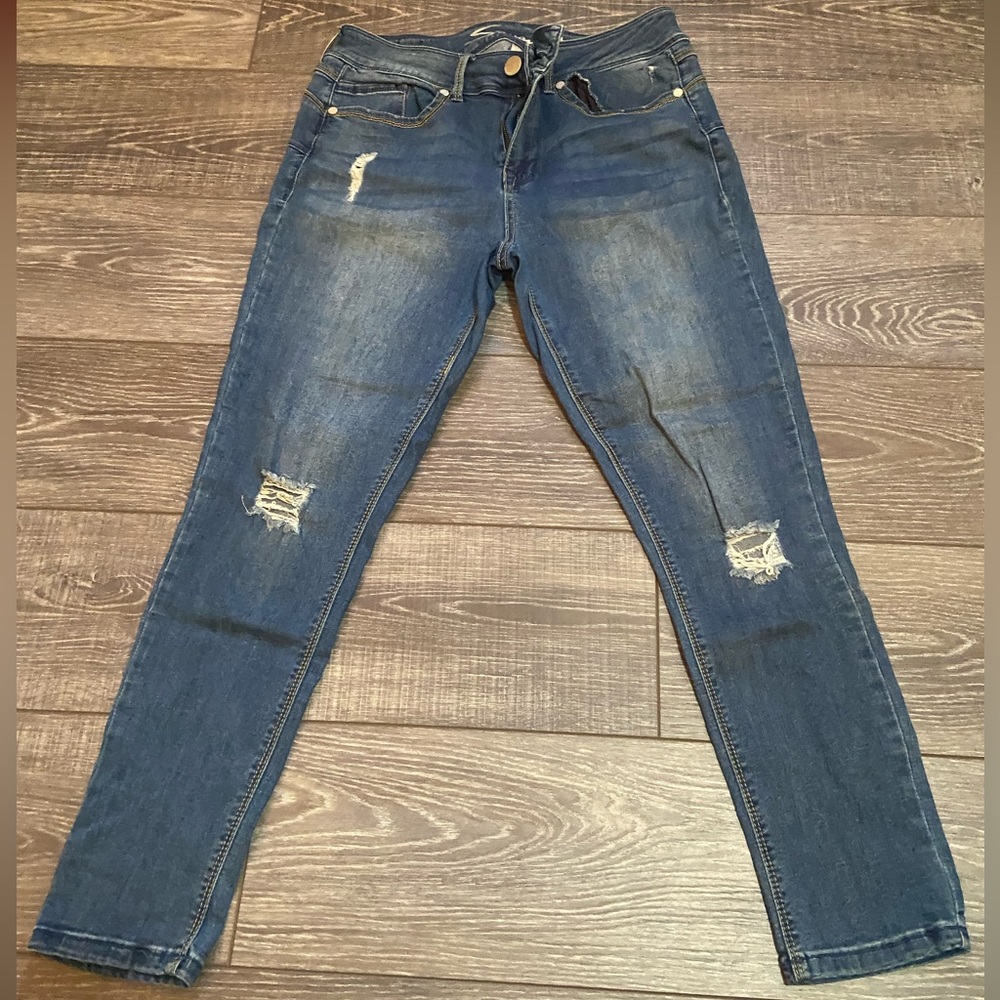 Seven Jeans from Maurice’s , blue wash with minimal rips, size 12